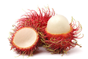 Fresh rambutan cut open to reveal fresh white rambutan flesh. isolated on white background.