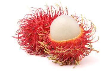 Fresh rambutan cut open to reveal fresh white rambutan flesh. isolated on white background.