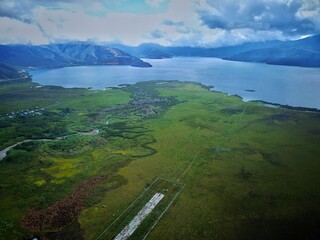 The beauty of Lake Anggi Giji, captured from a drone. Waterways flow from small rivers to the...