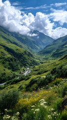 Naklejka premium Majestic Mountain Valley Panorama with Wildflowers and a Winding River