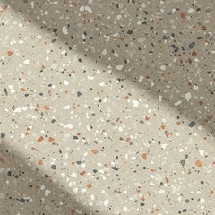 Modern terrazzo pattern with speckled texture, muted clay tones, minimal seamless background