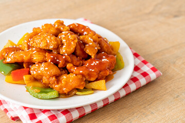fried crispy chicken with sweet and sour sauce