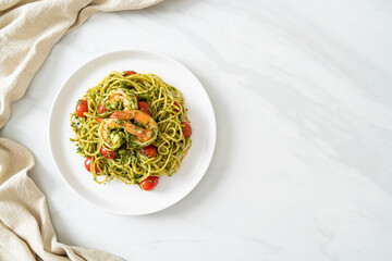 Spaghetti with prawns or shrimps in homemade pesto sauce