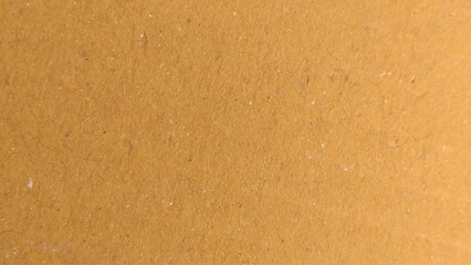 Background of brown kraft paper or cardboard texture. Brown kraft paper background. Kraft paper texture background wallpaper. 