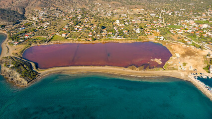 Red salt sea lake, at winter, village Alyki, Boeotia, Greece.