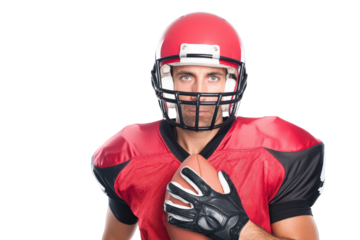 An american football player in full gear holds a football, looking intensely at the camera, isolated on transparent background