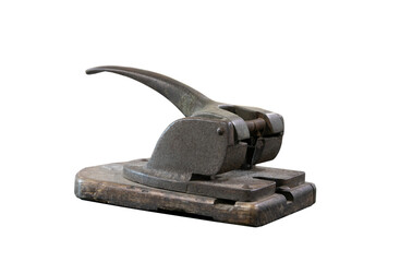Vintage iron paper hole puncher isolated on white background.