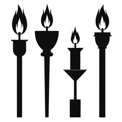 Black silhouettes of four torches and candles with flames fire light