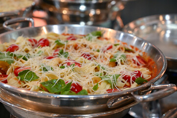 spaghetti, spaghetti with cheese and cherry tomatoes, tagliatelle, delicious pasta dishes, buffet...
