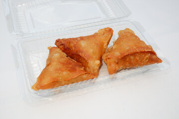 Jalangkote, traditional deep-fried snack from South Sulawesi, Indonesia, isolated on white background