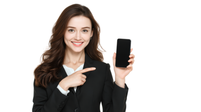 Professional woman pointing at smartphone, smiling, dressed in a suit, white isolated background.