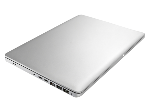A closed silver laptop with visible ports on a black background in a studio setting close up view