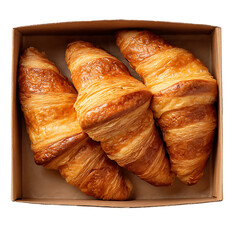 Three golden brown croissants in a box, top view.