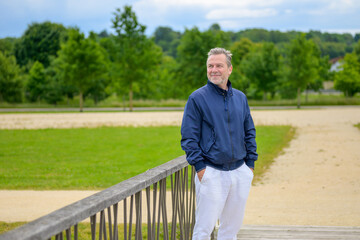 Confident Senior Man In Park