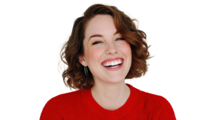 A joyful woman in a red sweater smiling broadly against a white background.