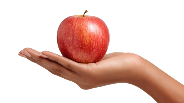 Fresh red apple held in a hand, isolated on a white background.