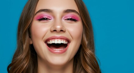 Woman smiling joyfully studio shot