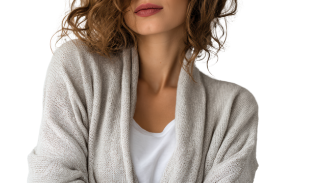 Woman in cozy cardigan on white isolated background, embracing a warm and relaxed atmosphere.