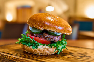 Juicy Burger on Wooden Tray in Cozy Rustic Cafe Interior