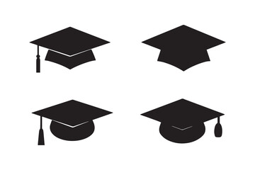 Set of four black graduation caps or academic mortarboards with tassels