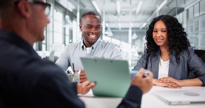 Real Estate Agent Helping African American Couple