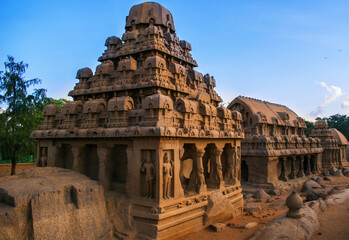 Fototapeta premium Ancient wonders carved in stone—Mahabalipuram's Five Rathas, Shore Temple, lighthouse, Arjuna’s Penance & Krishna’s Butterball echo tales of Pallava craftsmanship and coastal heritage.