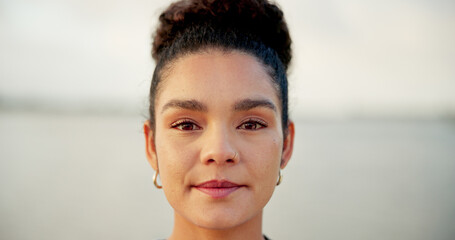 Portrait, woman and travel outdoor for vacation, weekend break and adventure trip. Face, female person and space with morning peace for holiday, tourist destination and calm for getaway abroad