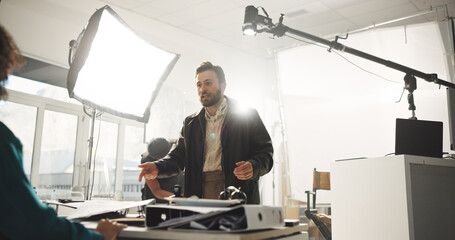 Conversation, creative and director with actress in studio for feedback or instructions on film...