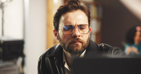 Thinking, man and editor in studio for editing with post production, process or casting online....