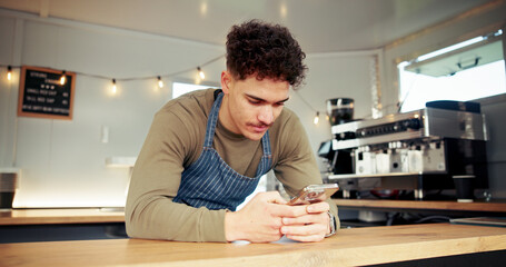 Food truck, waiter and man with phone at counter for social media, internet and online on break....