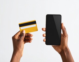 Close-up of hands holding credit card and smartphone, online shopping concept, white background, natural light