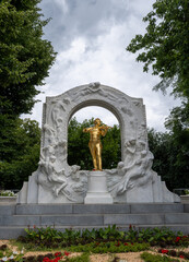 Front side photo of the Johann Strauss monument at Vienna, Cloudy sky at the background.