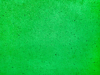 Terrazzo light green speckled concrete wall texture. Minimalist industrial background. Modern design element. Grungy surface. Copy space.