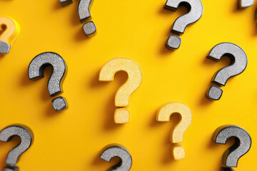 question marks on yellow background
