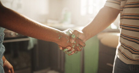 Agreement, handshake and painting with people in kitchen for deal, maintenance or renovation. Construction, real estate or thank you with homeowner and painter shaking hands for building or success