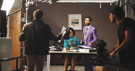 Director, film and production with people on set for casting, rehearsal or videography...
