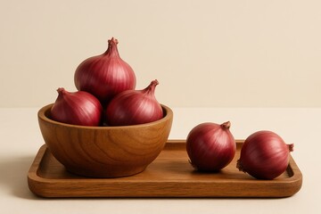 Red onions in wooden bowl and tray