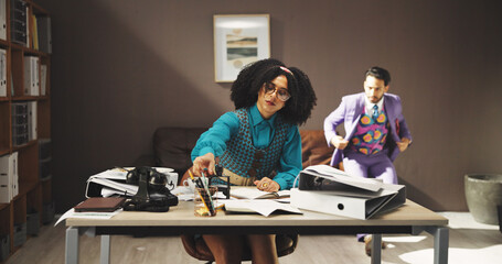 Busy, fashion and planning with business woman at desk in retro office for clothing design....