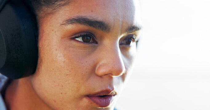 Headphones, woman thinking or runner with sky space for training, workout or exercise. Outdoor, resting or sports girl athlete on break for streaming radio, music mockup or fitness podcast to relax