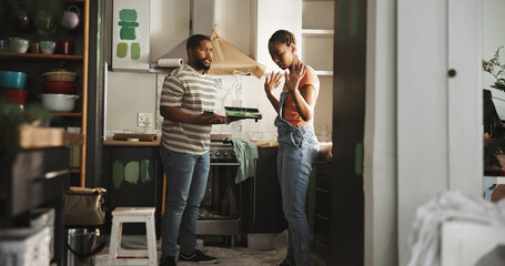 Home improvement, fight and couple with paint, kitchen and argument for color of apartment or...