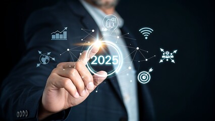 Fototapeta premium Businessman touches 2025 digital display with connection nodes, illustrating future technology trends, innovation, and network opportunities in emerging markets.