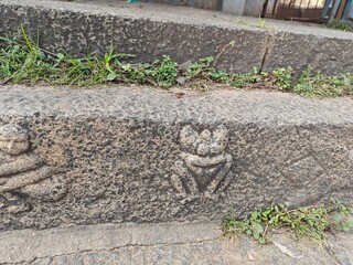 A spiritually resonant view of Thirukazhukundram, Tamil Nadu, India, capturing both the hilltop Vedagiriswarar Temple and the ancient foothill temple complex. The hill temple, dedicated to Lord Shiva,