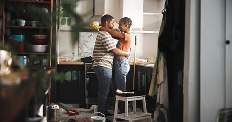 Renovation, dance and happy couple in home for love, remodeling and bonding together with care....