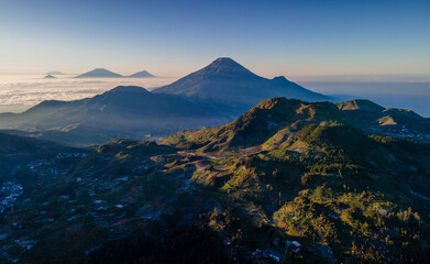 Aerial Photo of Dieng Plateau at Sunrise with Mountain View. Wide angle