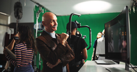 Man, movie director or watching scene in studio with cameraman for action, playback or recording....