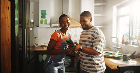 Happy, black couple and phone for painting new house for planning, renovation and interior design....