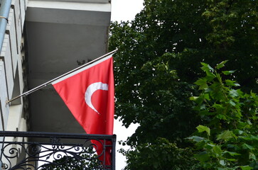 Turkish Flag Displayed on a Balcony