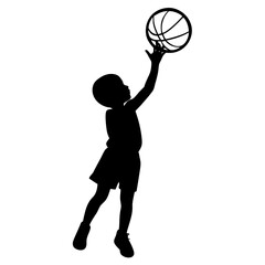 Fototapeta premium Young child reaching for basketball silhouette playing