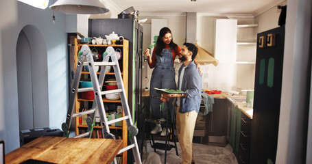 Smile, couple and painting new house for renovation process, interior design and decoration....