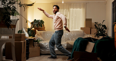 Moving, dancing and man in new home with boxes with fun for property investment with music. Happy,...